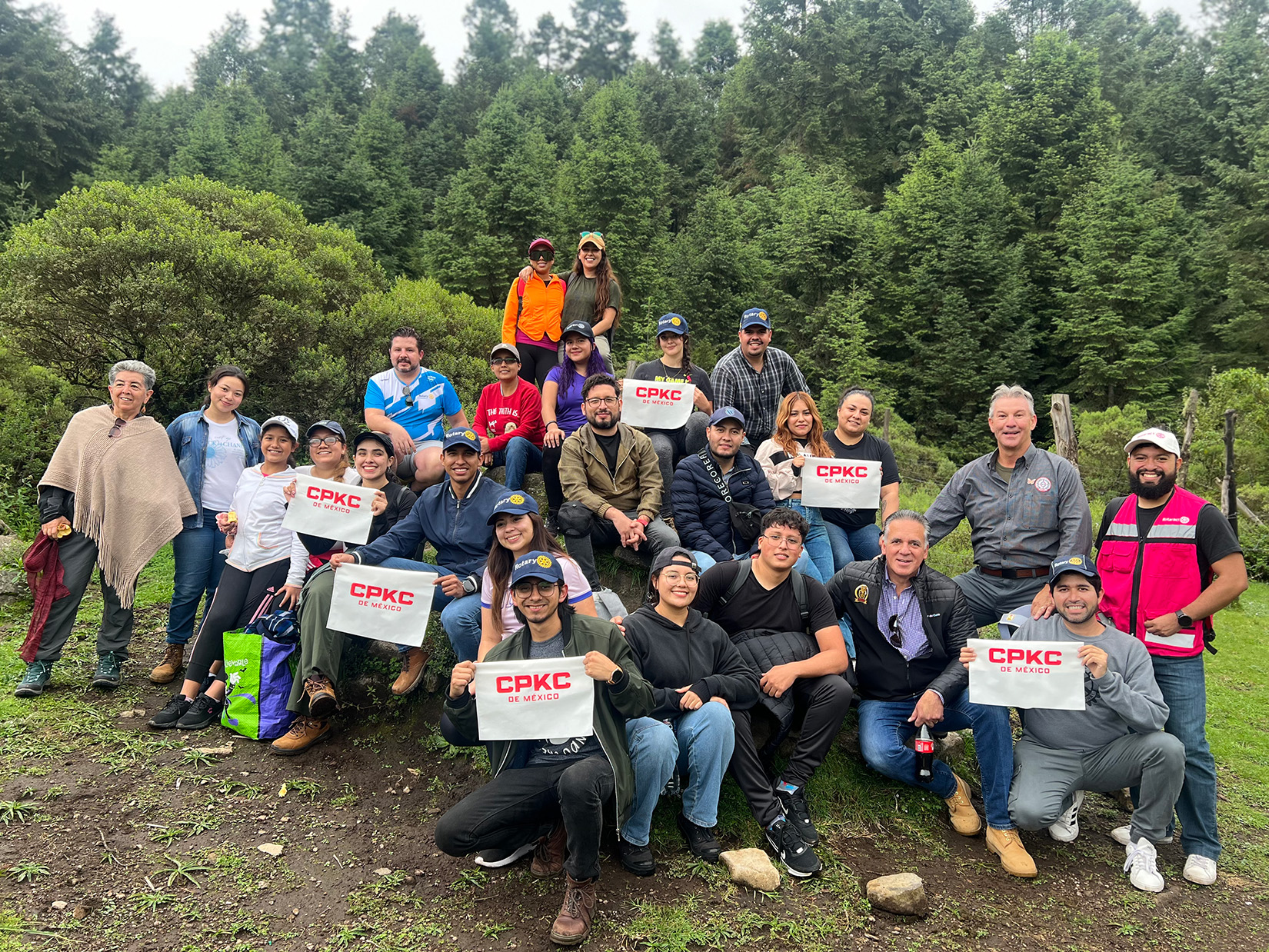 Group of CPKC de Mexico employees planting trees